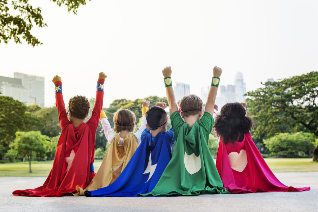 Superheroes Cheerful Kids Expressing Positivity Concept